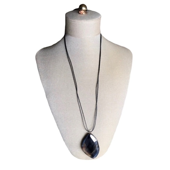 Jewelry - Polished purple stone necklace on black cord